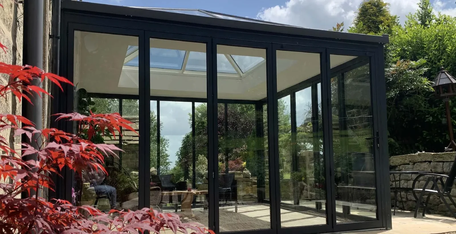 A bright glazed garden room fitted by O'Sullivan Glazing Systems